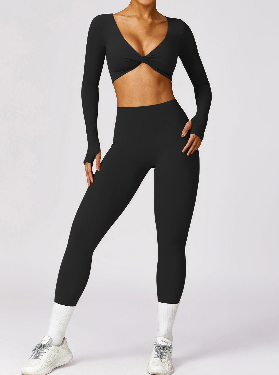 Livia | Langarm-Crop-Top met Twist-Detail