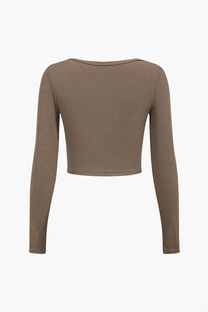 Amira | Asymmetrisch Langarmtop met Cut-Out & Knopdetails