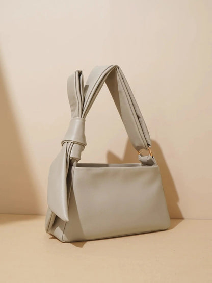 Edith | Minimalistische Leren Schoudertas met Knoopgreep