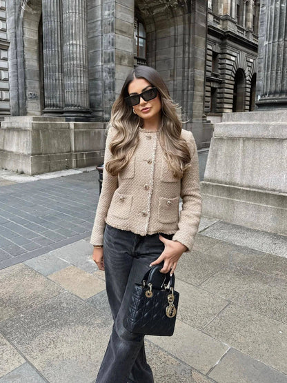 Elegant damesvest met knoopsluiting en zakken – Nilda