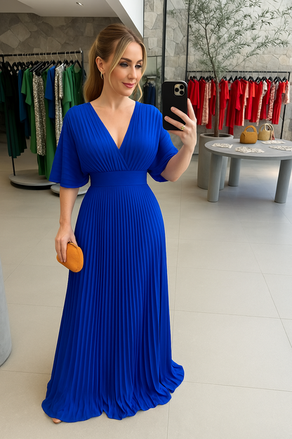 Elegante maxi jurk met plissérok en wijde mouwen