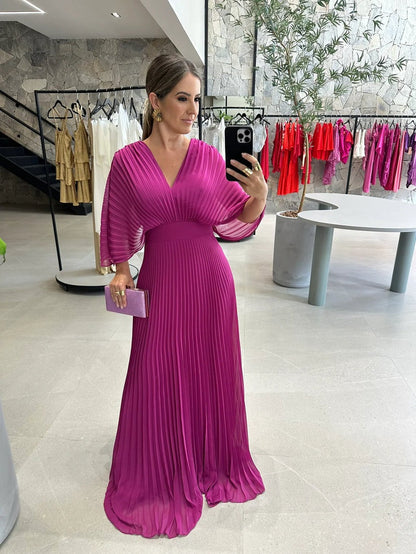 Elegante maxi jurk met plissérok en wijde mouwen