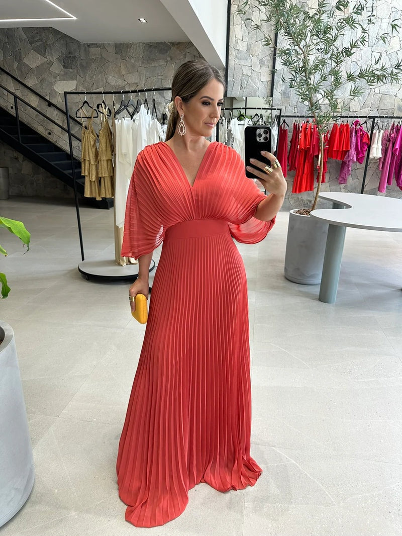 Elegante maxi jurk met plissérok en wijde mouwen