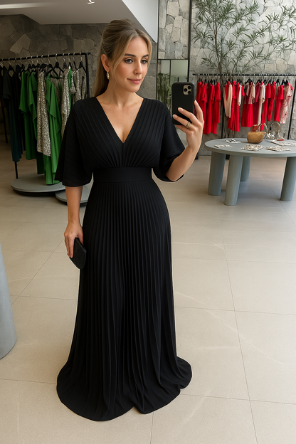 Elegante maxi jurk met plissérok en wijde mouwen