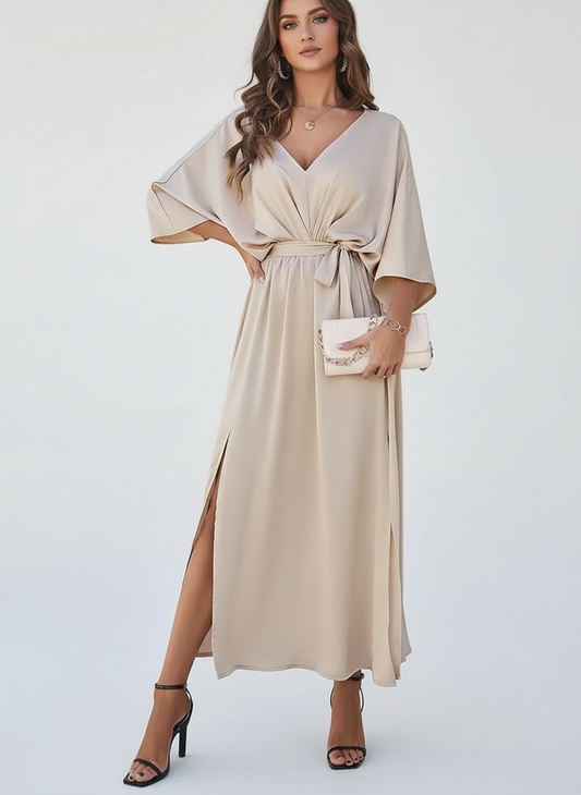 Elegante maxi jurk met strikceintuur en V-hals
