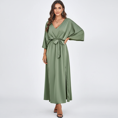 Elegante maxi jurk met strikceintuur en V-hals