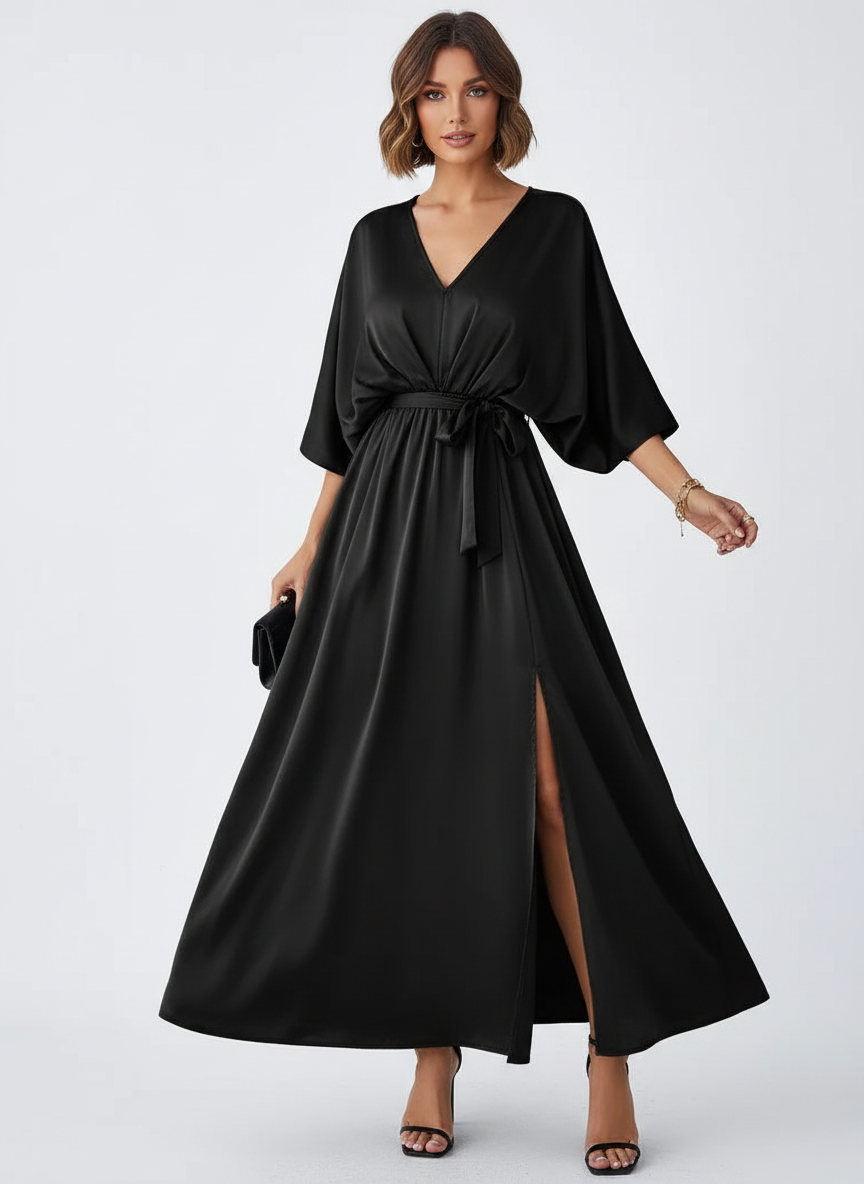 Elegante maxi jurk met strikceintuur en V-hals