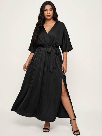 Elegante maxi jurk met strikceintuur en V-hals
