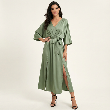 Elegante maxi jurk met strikceintuur en V-hals