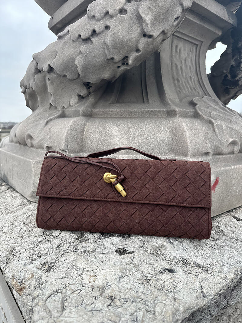 Finja | Gevlochten Clutch van Kunstleer