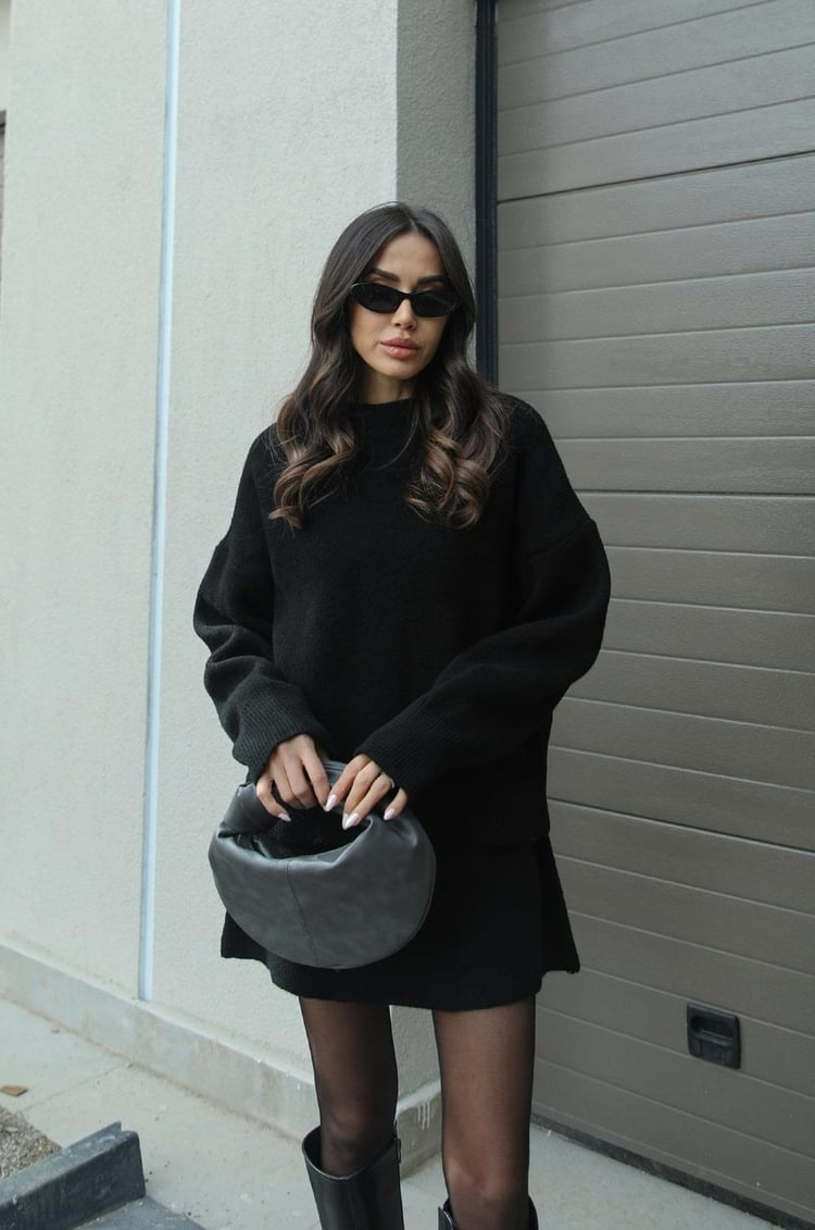 Gebreide tweedelige dames set met oversized trui en rok