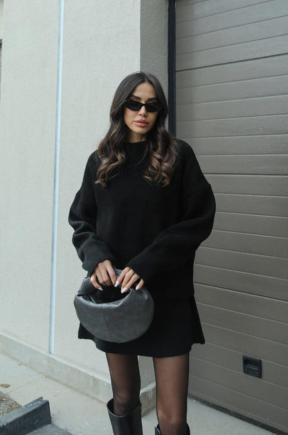 Gebreide tweedelige dames set met oversized trui en rok
