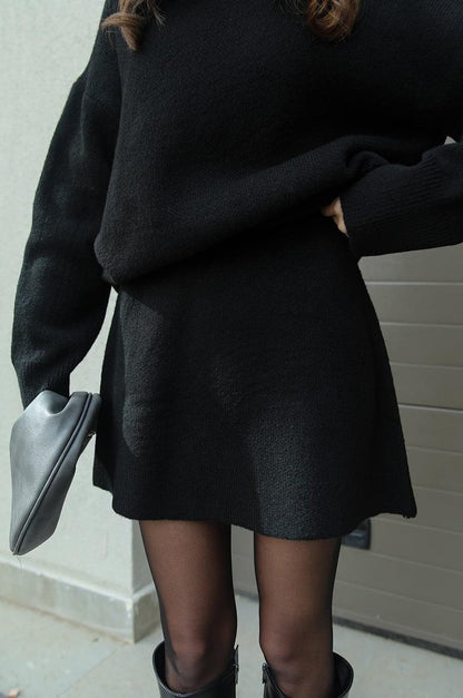 Gebreide tweedelige dames set met oversized trui en rok