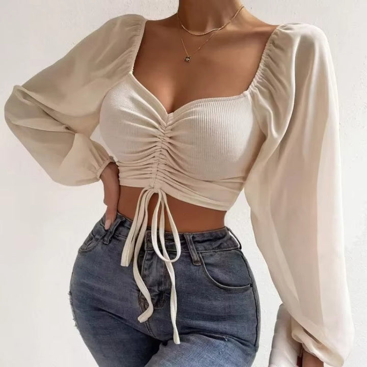 Gerimpte crop blouse met sheer mouwen – Aura