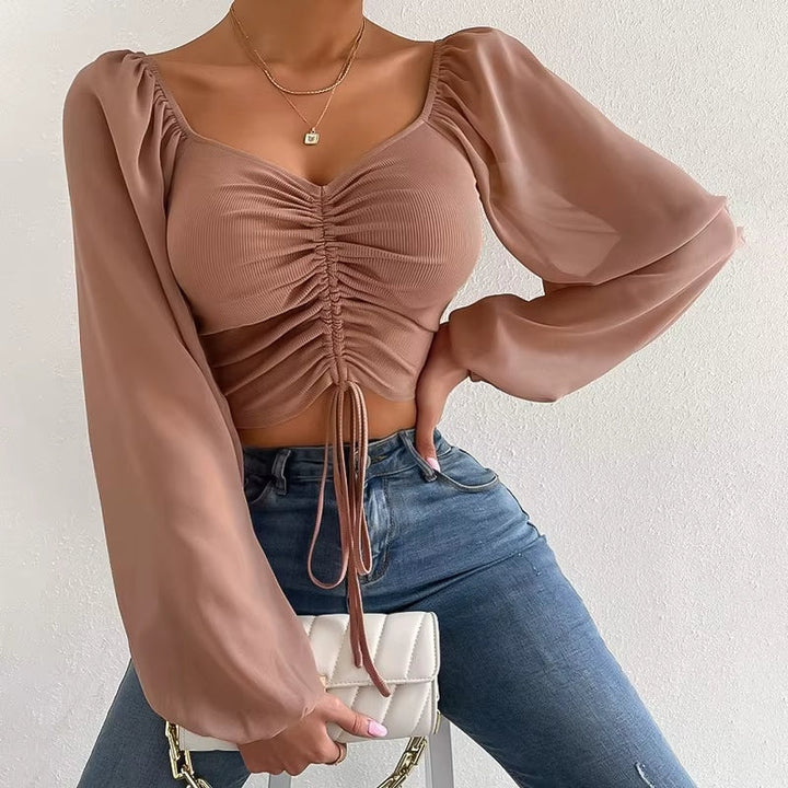 Gerimpte crop blouse met sheer mouwen – Aura