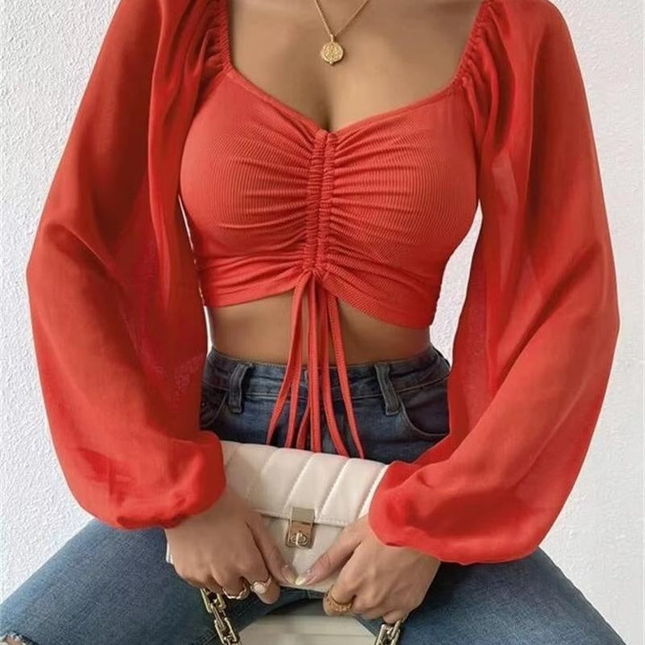 Gerimpte crop blouse met sheer mouwen – Aura