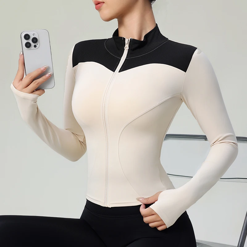 Getailleerde dames sport top met lange mouwen – Elev