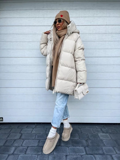 Gewatteerde dames winterjas met capuchon en lange lengte