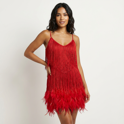 Glamoureuze pailletten veren cocktailjurk