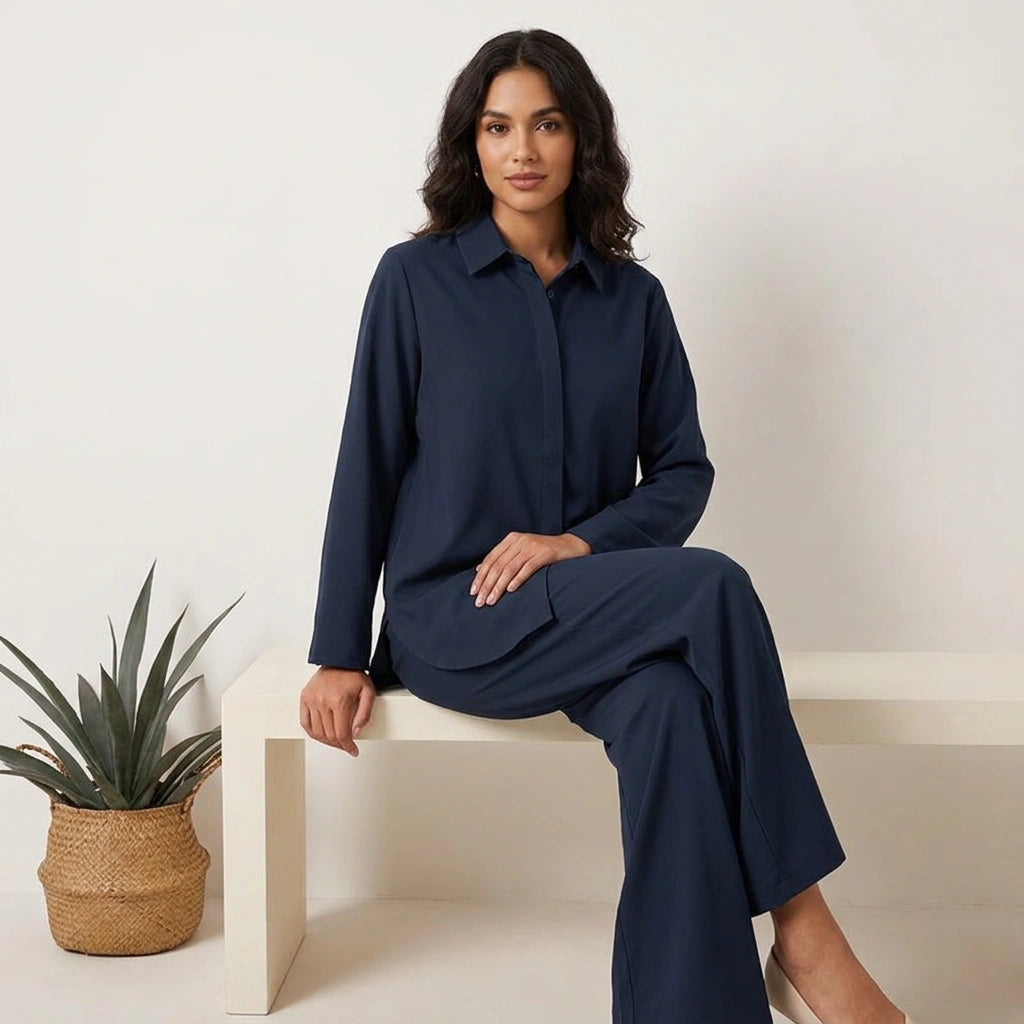 Luchtige tweedelige dames set met blouse en wijde broek