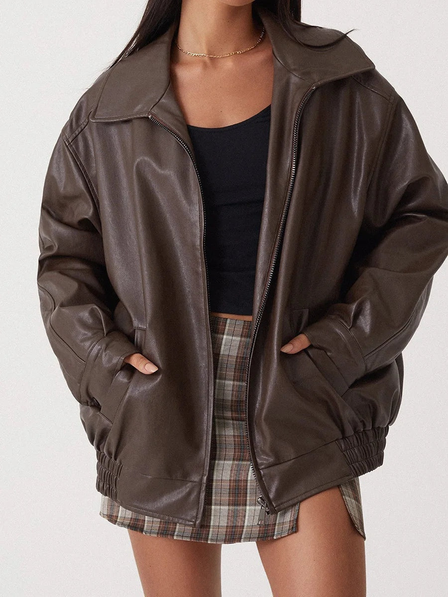 Modern oversized damesjack met rits en brede kraag