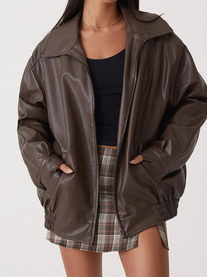 Modern oversized damesjack met rits en brede kraag