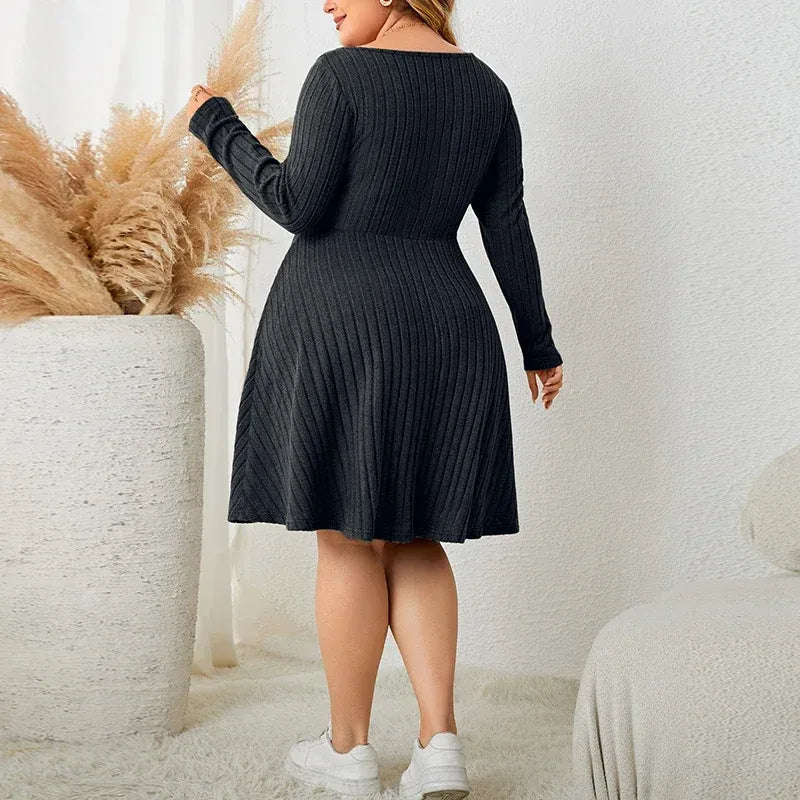Ribgebreide midi jurk met strikdetail – Avani