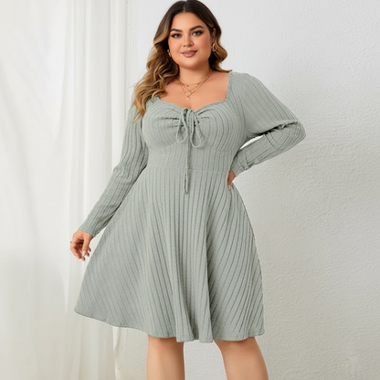 Ribgebreide midi jurk met strikdetail – Avani