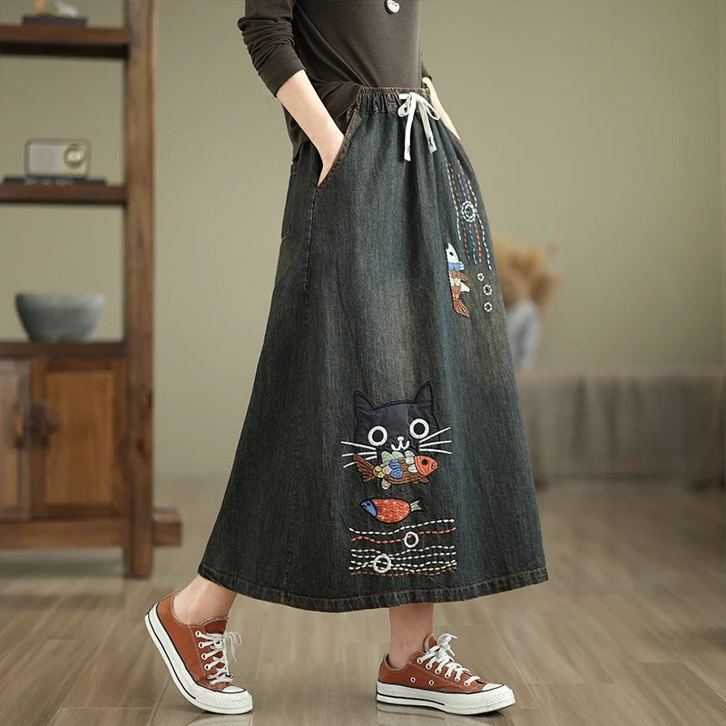 Speelse denim maxi rok met borduurdetails – Elodie