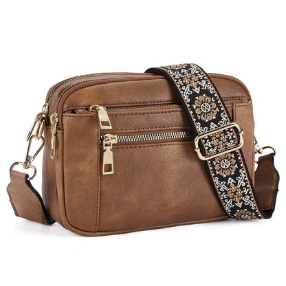 Trendy crossbody tas met verstelbare decoratieve band