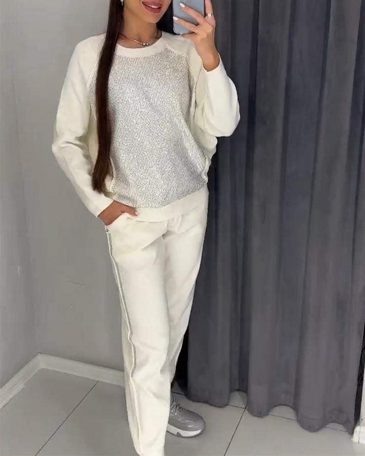 Trendy damespak met subtiele glansdetails