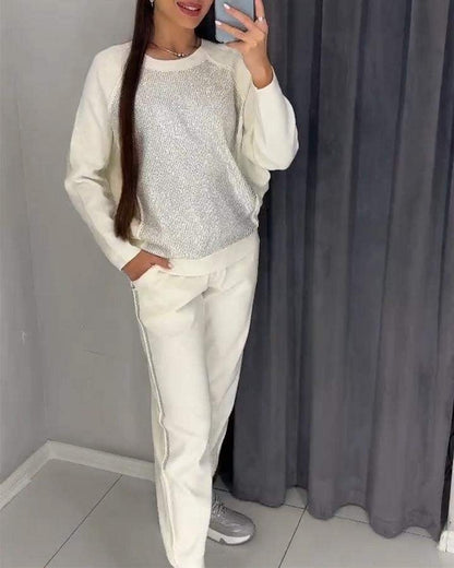 Trendy damespak met subtiele glansdetails
