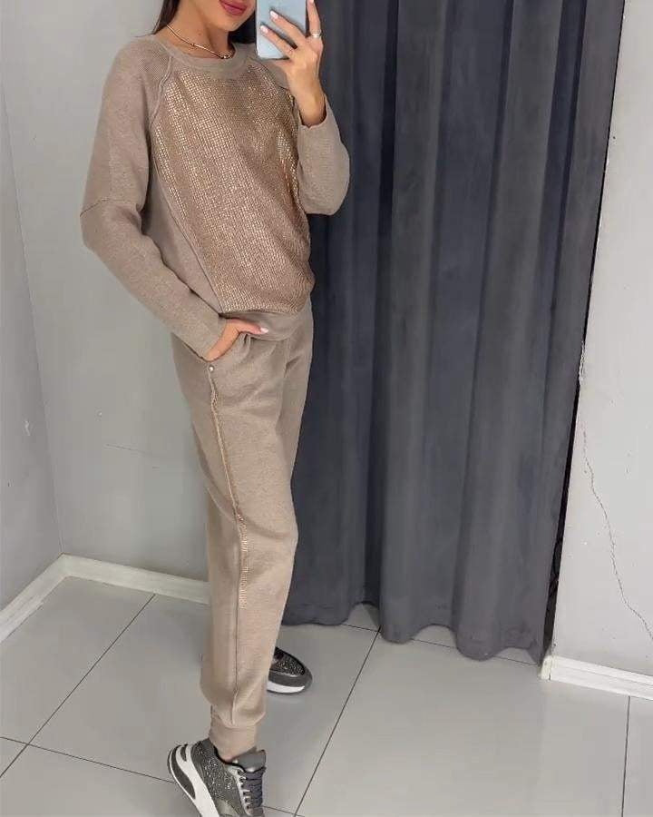 Trendy damespak met subtiele glansdetails