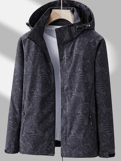 Waterafstotende dames outdoorjas met capuchon en bladprint