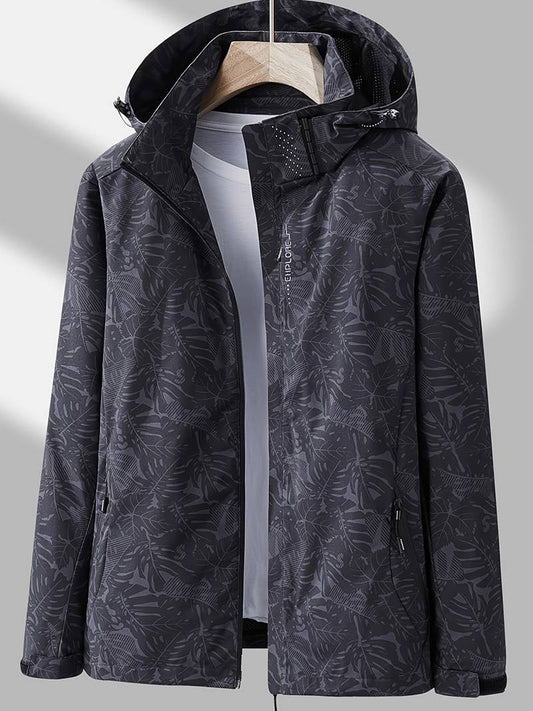 Waterafstotende dames outdoorjas met capuchon en bladprint