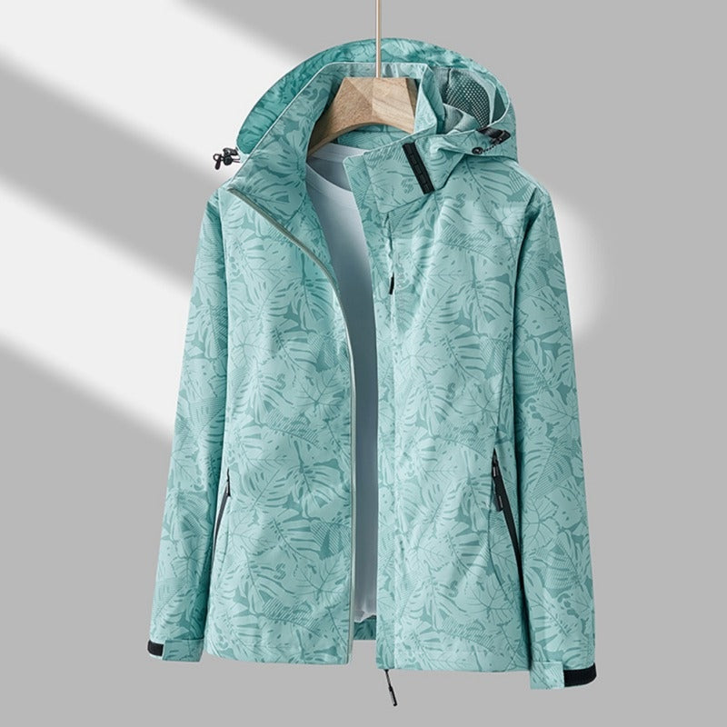 Waterafstotende dames outdoorjas met capuchon en bladprint