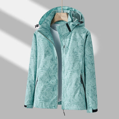 Waterafstotende dames outdoorjas met capuchon en bladprint