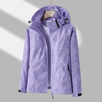 Waterafstotende dames outdoorjas met capuchon en bladprint